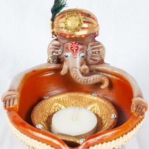 Ganesh Decorated With Big Diwa, With Ceramic Diwa & Candle - 13X10cm